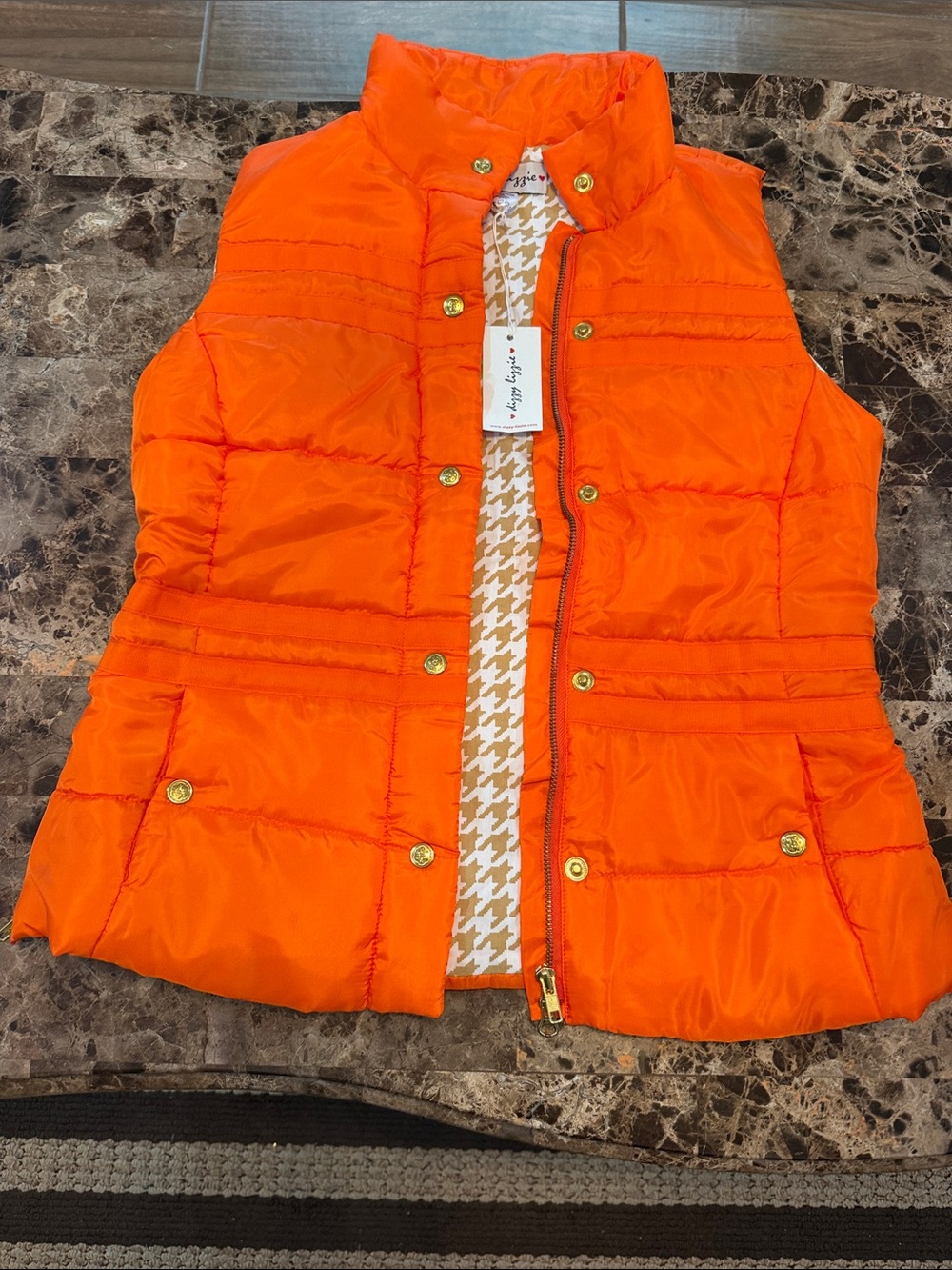 Bright Orange Puffer Vest with Gold Snap Details